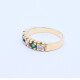 Anillo medio sin fin oro 18k amarillo con brillantes y esmeraldas engarce 4 puntas. Anillo medio sin fin oro 18k amarillo con brillantes y esmeraldas engarce 4 puntas.