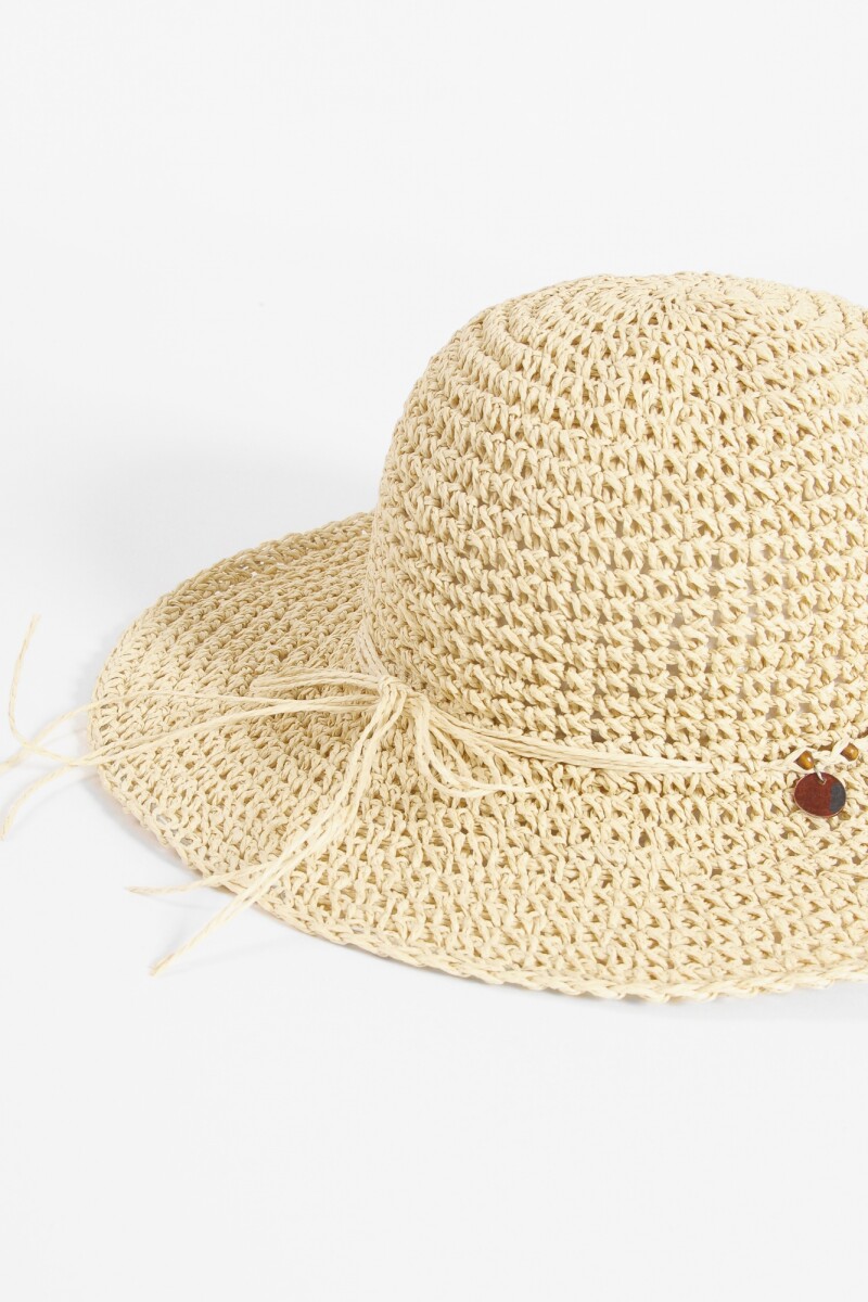Gorro playero con borlas beige