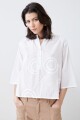 Blusa con círculos aplicados blanco