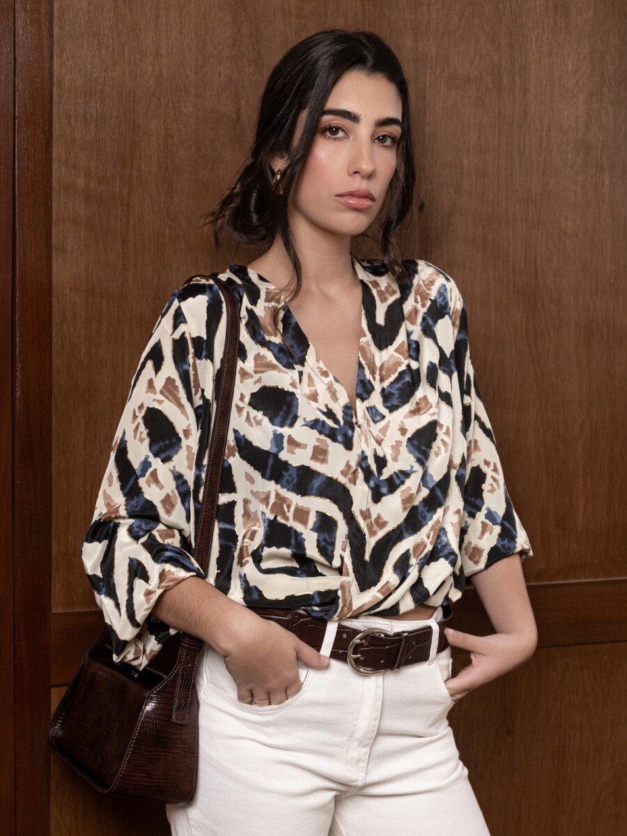 Blusa Cruzada. 