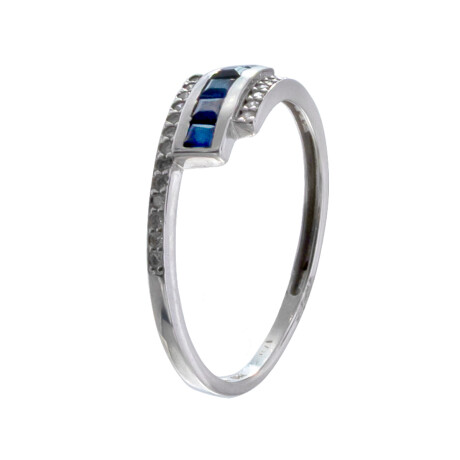Anillo de oro 18 ktes gris con zafiro y brillante. Anillo de oro 18 ktes gris con zafiro y brillante.