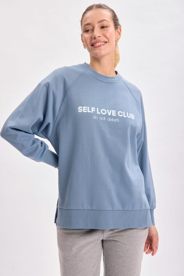 Buzo deportivo oversize estampa Self Azul
