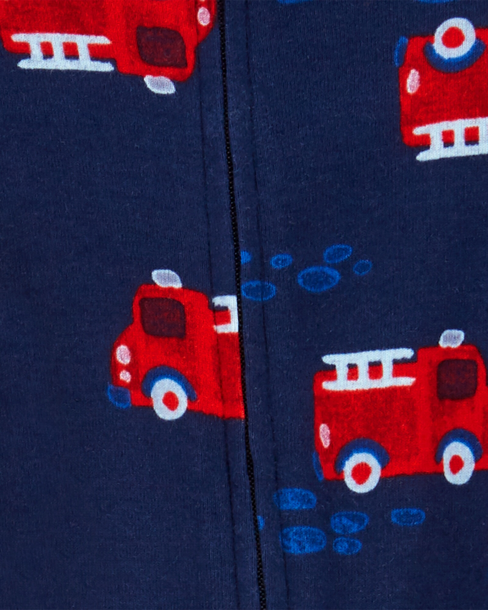 Pack dos pijamas una pieza de algodón, con pie, diseño bombero Pack dos pijamas una pieza de algodón, con pie, diseño bombero