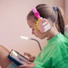 Auriculares bluetooth con vincha diseño dinosaurio rosado Auriculares bluetooth con vincha diseño dinosaurio rosado
