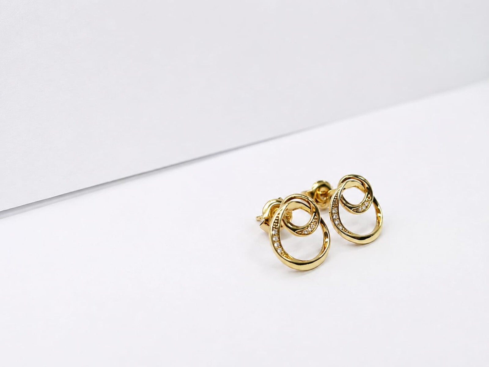 Caravanas doble aro con zirconias Oro 9 kt 