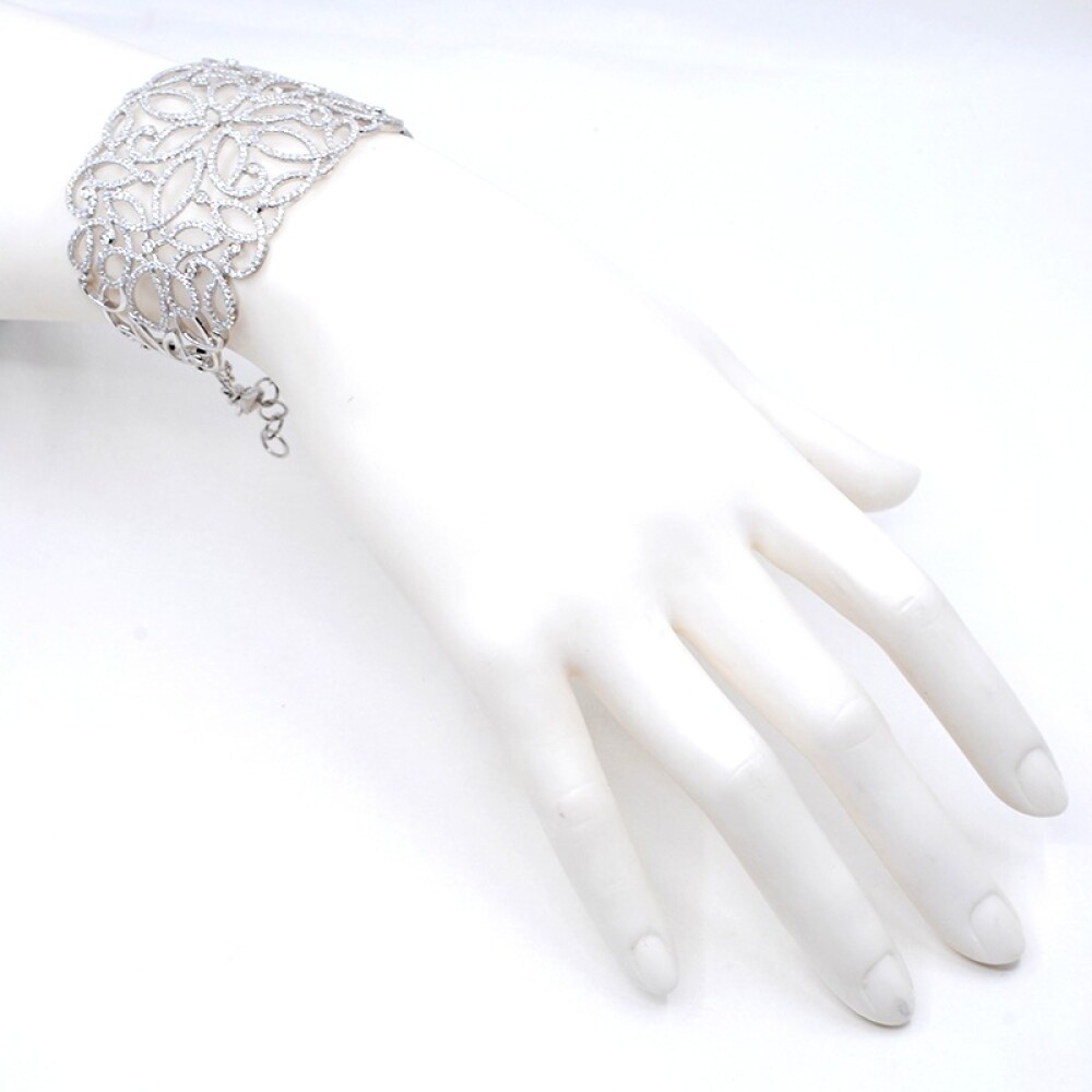 Pulsera en oro blanco 18k y brillantes Pulsera en oro blanco 18k y brillantes