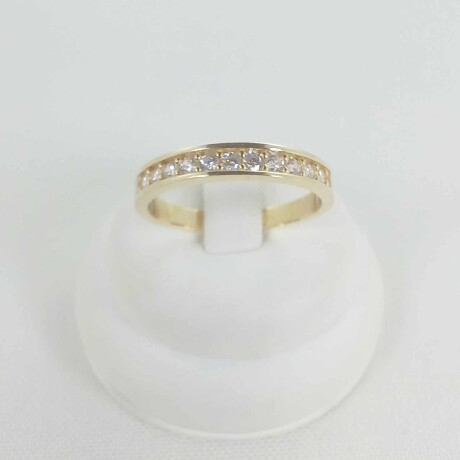 Anillo de oro 9 ktes con 11 circonias. Medio sin fin Anillo de oro 9 ktes con 11 circonias. Medio sin fin