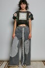 PANTALON CON PARCHE Negro