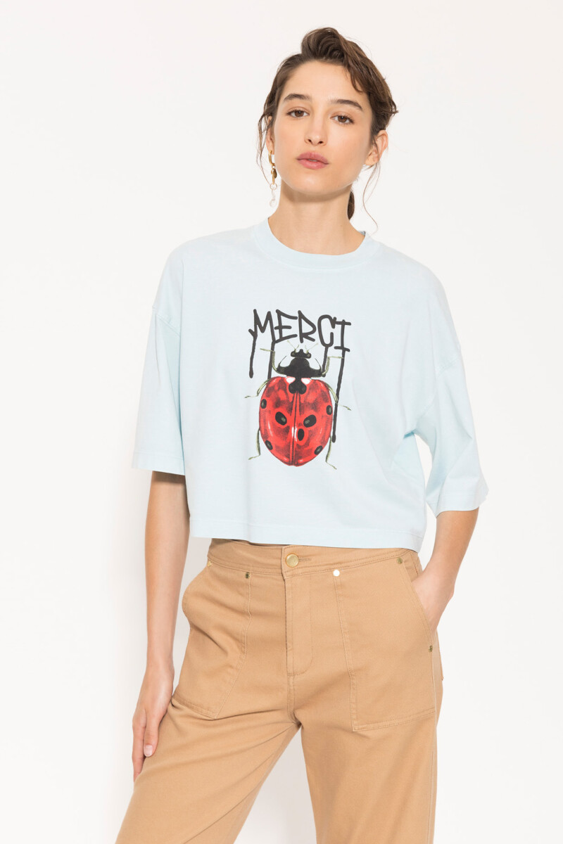 REMERA MERCI Celeste