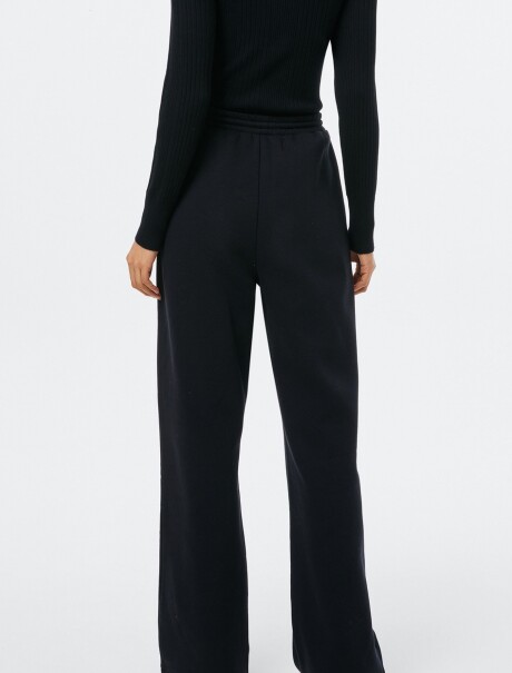 PANTALÓN CON BOLSILLOS - BLANCO NEGRO