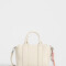 City Cartera City Con Charm - Blanco Crudo