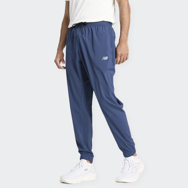 Pantalón New Balance Sport Essentials Woven Jogger Azul