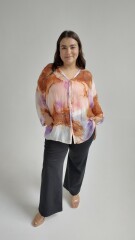 Blusa botánica Naranja