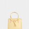 City Tendencia Cartera Mini City Trenzada - Amarillo Claro