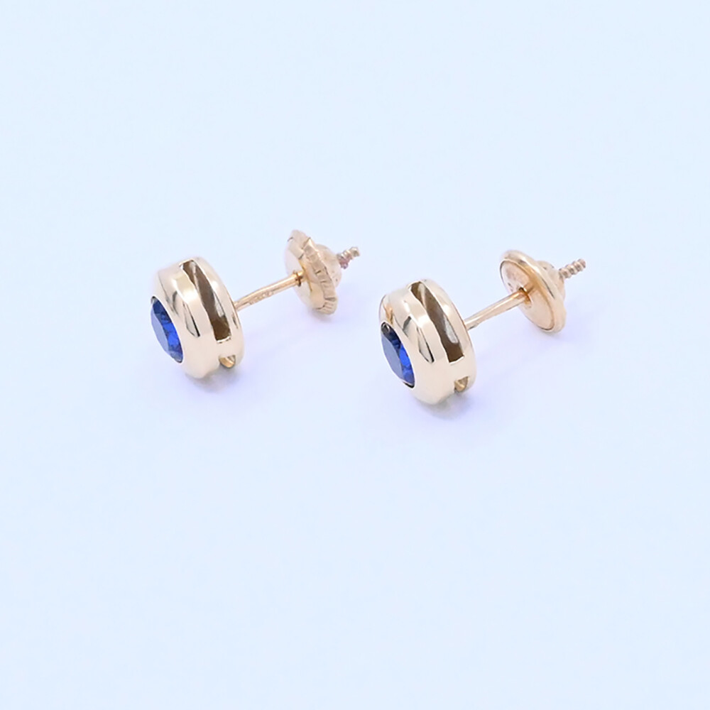 Caravanas oro 18k y zafiros engarce inglés. Caravanas oro 18k y zafiros engarce inglés.