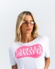 Remera top blanaca con letras rosadas U