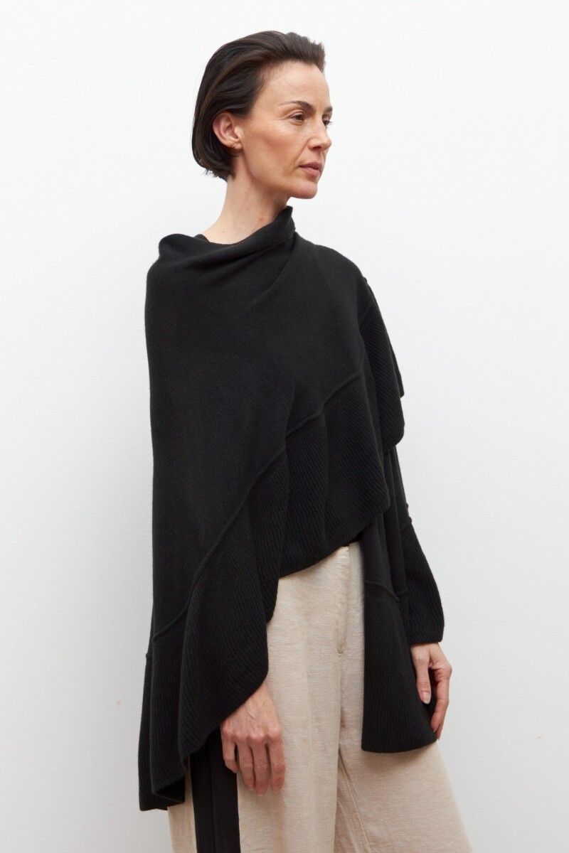 Capa tejida con volados negro