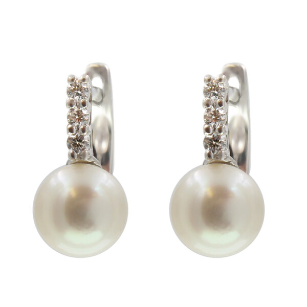 Caravanas Máxima en oro blanco 18k con perla de cultivo y brillantes. Caravanas Máxima en oro blanco 18k con perla de cultivo y brillantes.
