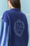 Cardigan de algodón con espalda bordada azul