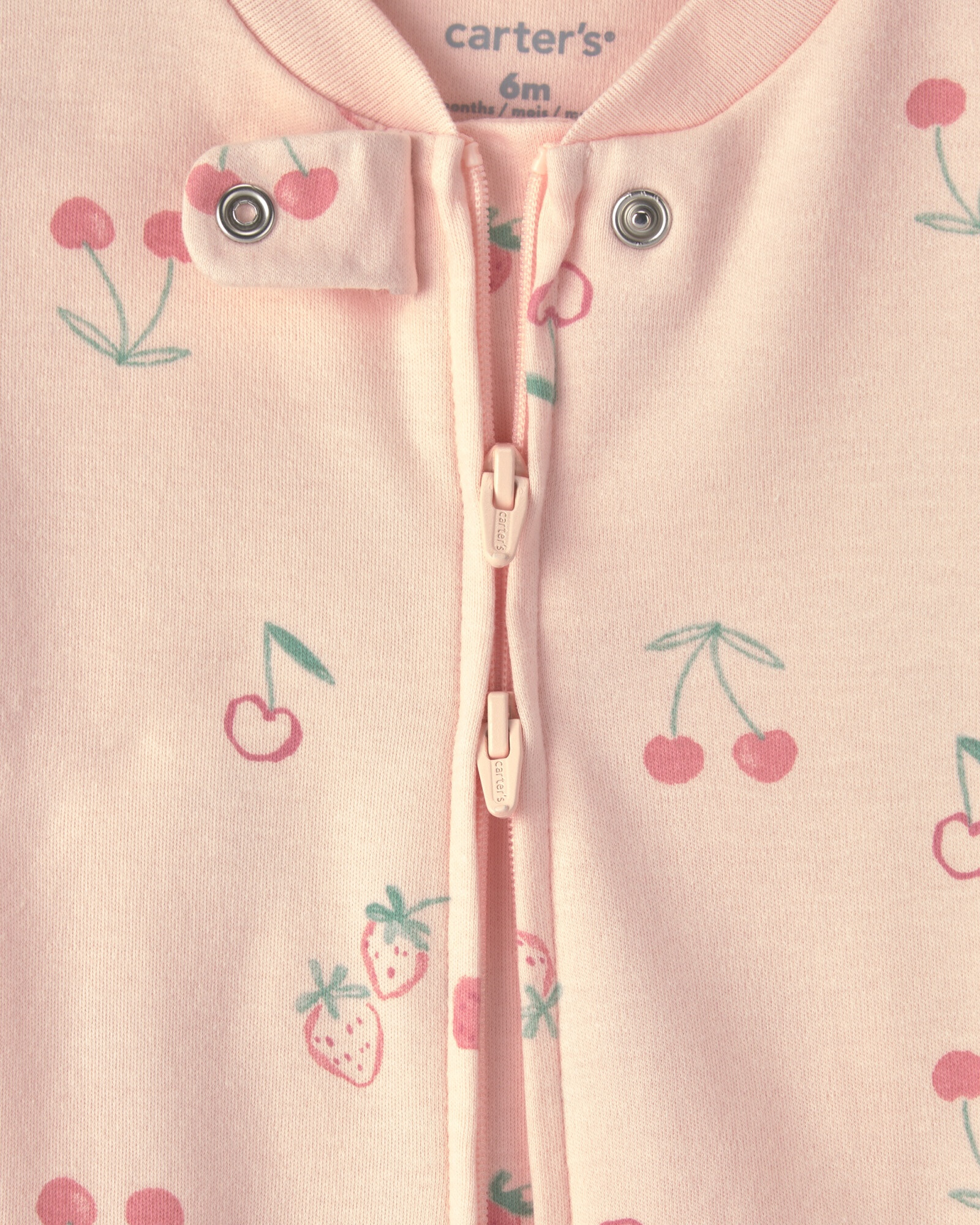 Pijama una pieza de algodón, con pie, rosado, diseño frutillas y cerezas Pijama una pieza de algodón, con pie, rosado, diseño frutillas y cerezas