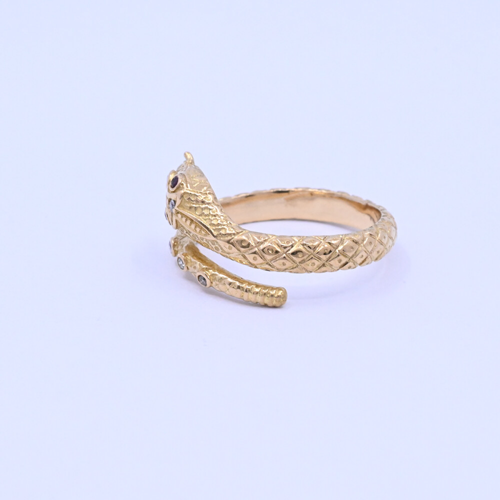 Anillo oro 18k brillantes y rubíes serpiente con punzones. Anillo oro 18k brillantes y rubíes serpiente con punzones.