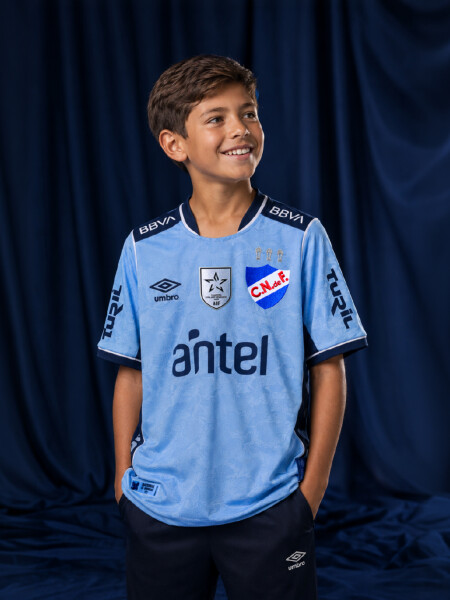 CAMISETA CELESTE EDICION 2026 Nacional Junior Skuba, Celeste