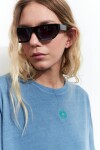 Remera washed bordada sol celeste