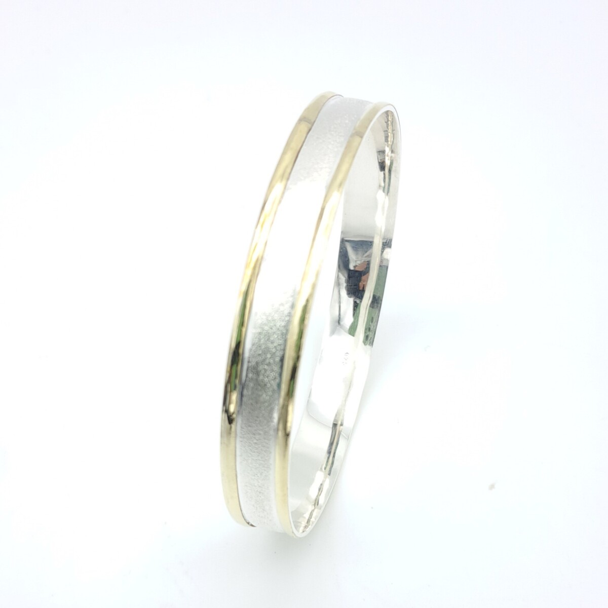 Esclava de plata 925 y double en oro 18 ktes. 