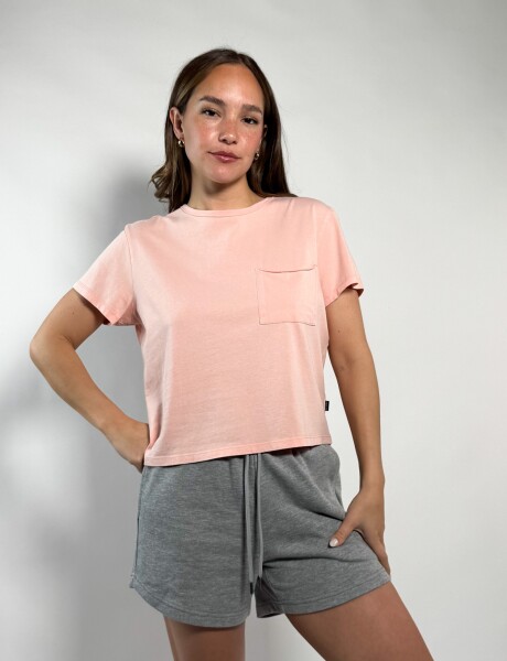 Remera con bolsillo Caro Coral