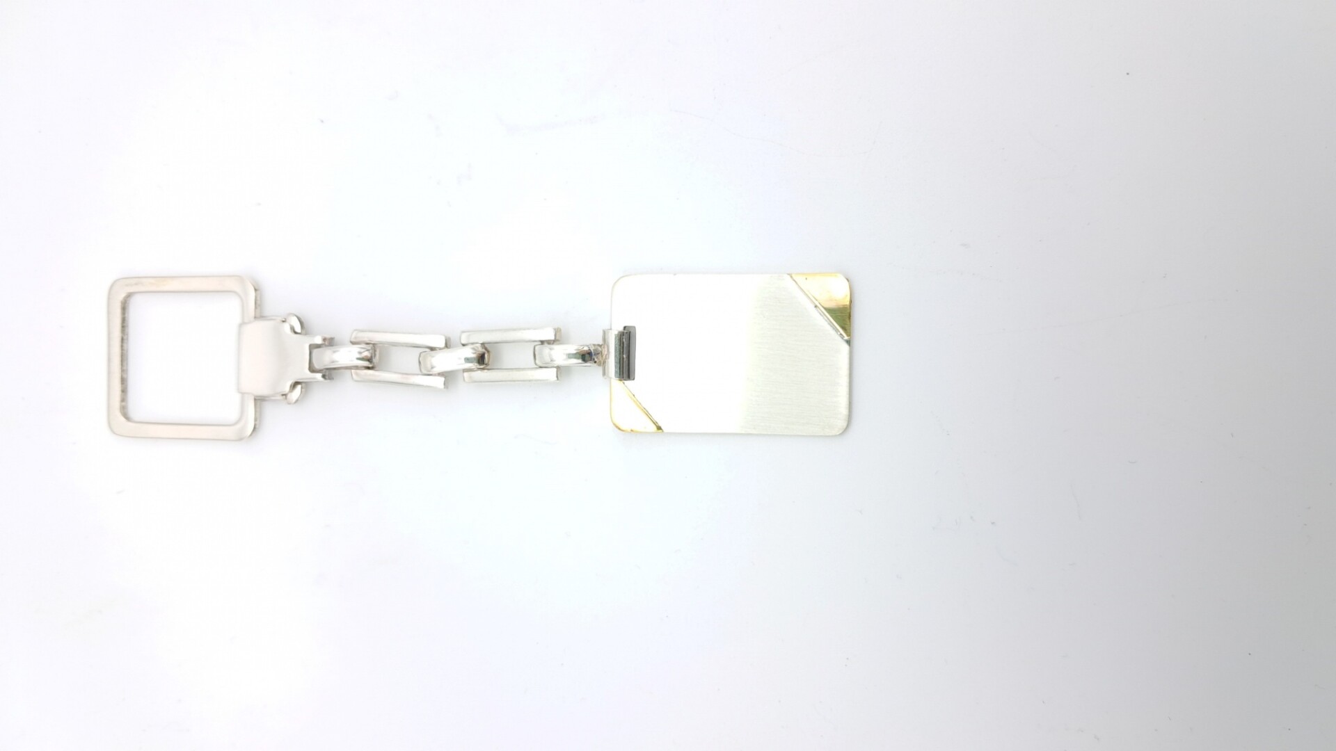 Llavero de plata 925 y double en oro 18 ktes. 