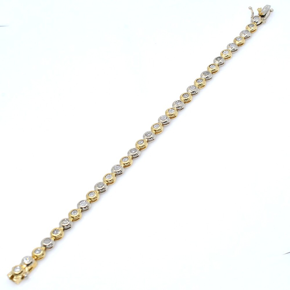 Pulsera en oro 18k de 2 colores y brillantes Pulsera en oro 18k de 2 colores y brillantes