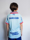 CAMISETA DE JUEGO OFICIAL AWAY 3 Nacional Junior Skuba, Celeste