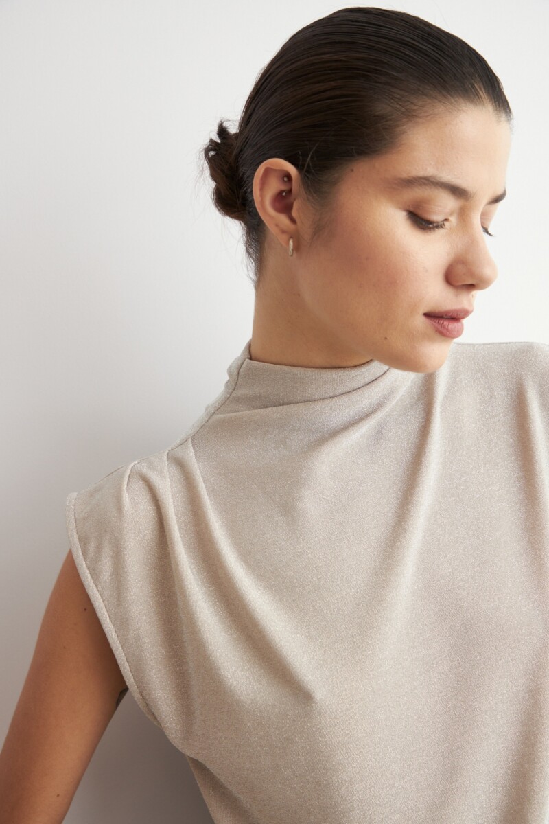 Blusa lurex con tablas beige