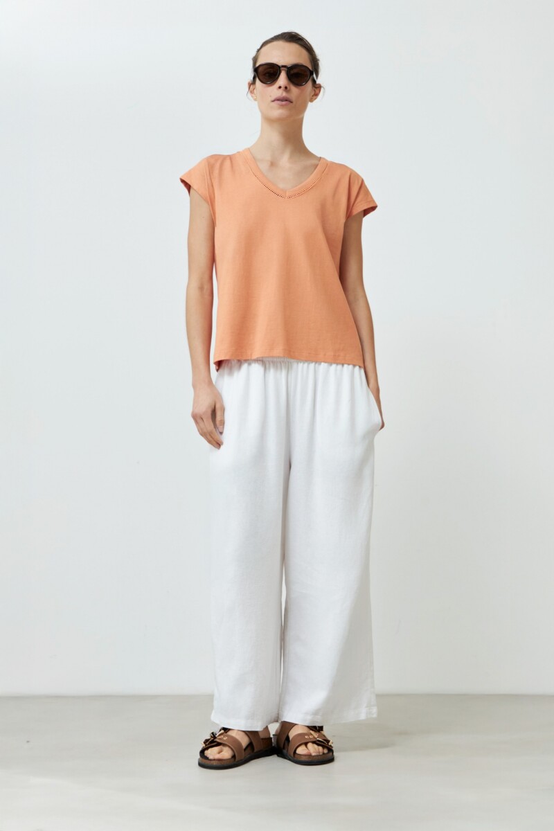 Remera con detalle trenza durazno