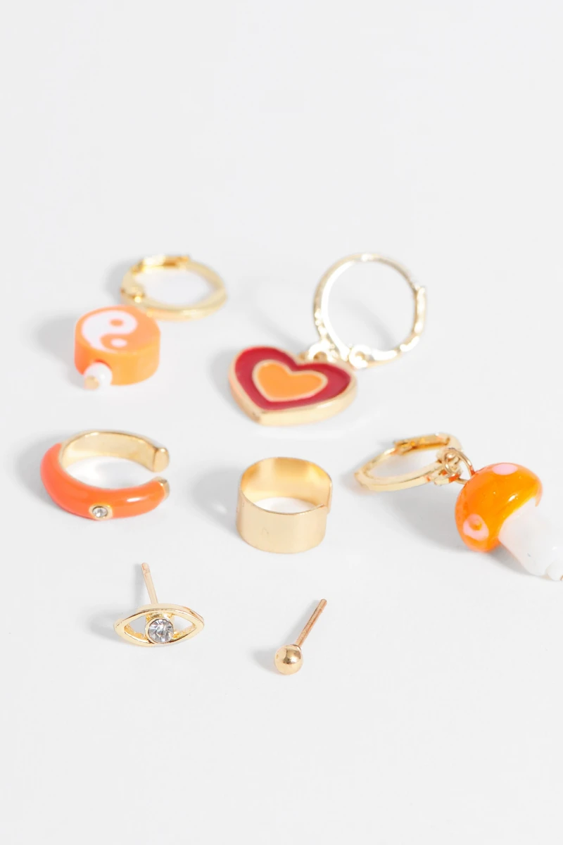 Set de caravanas dijes multiples dorado