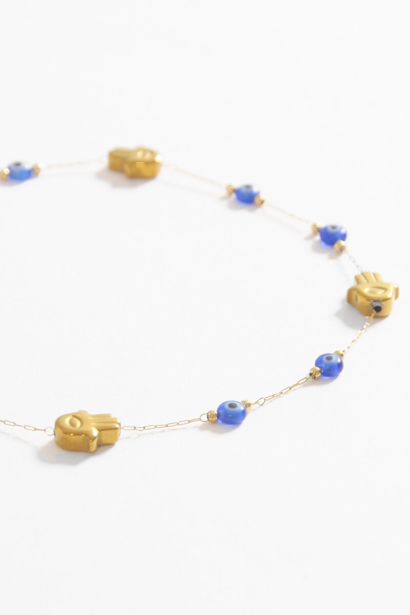 Tobillera acero ojitos hamsa resina dorado