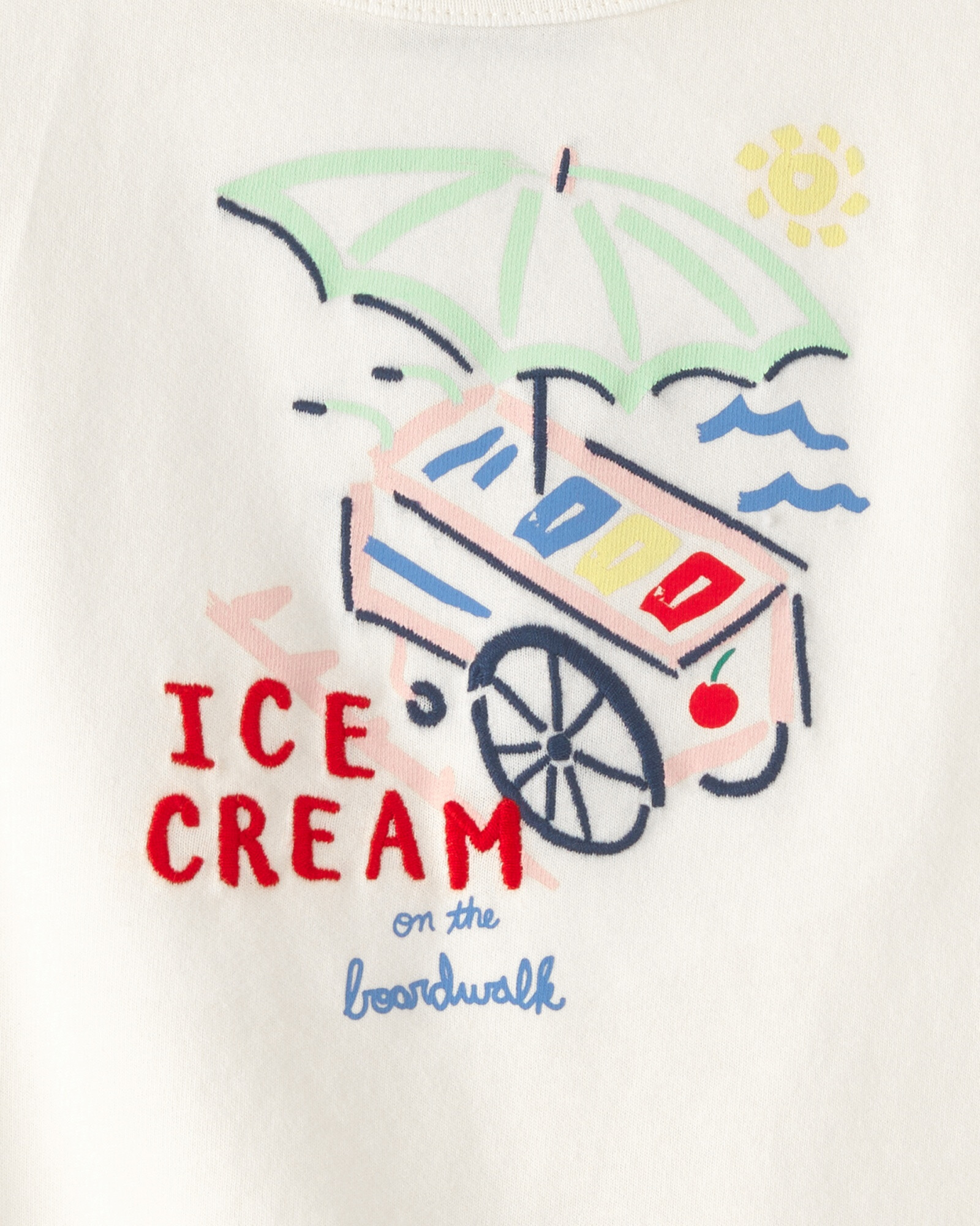 Remera de algodón, manga corta, color crema, estampa helado Sin color