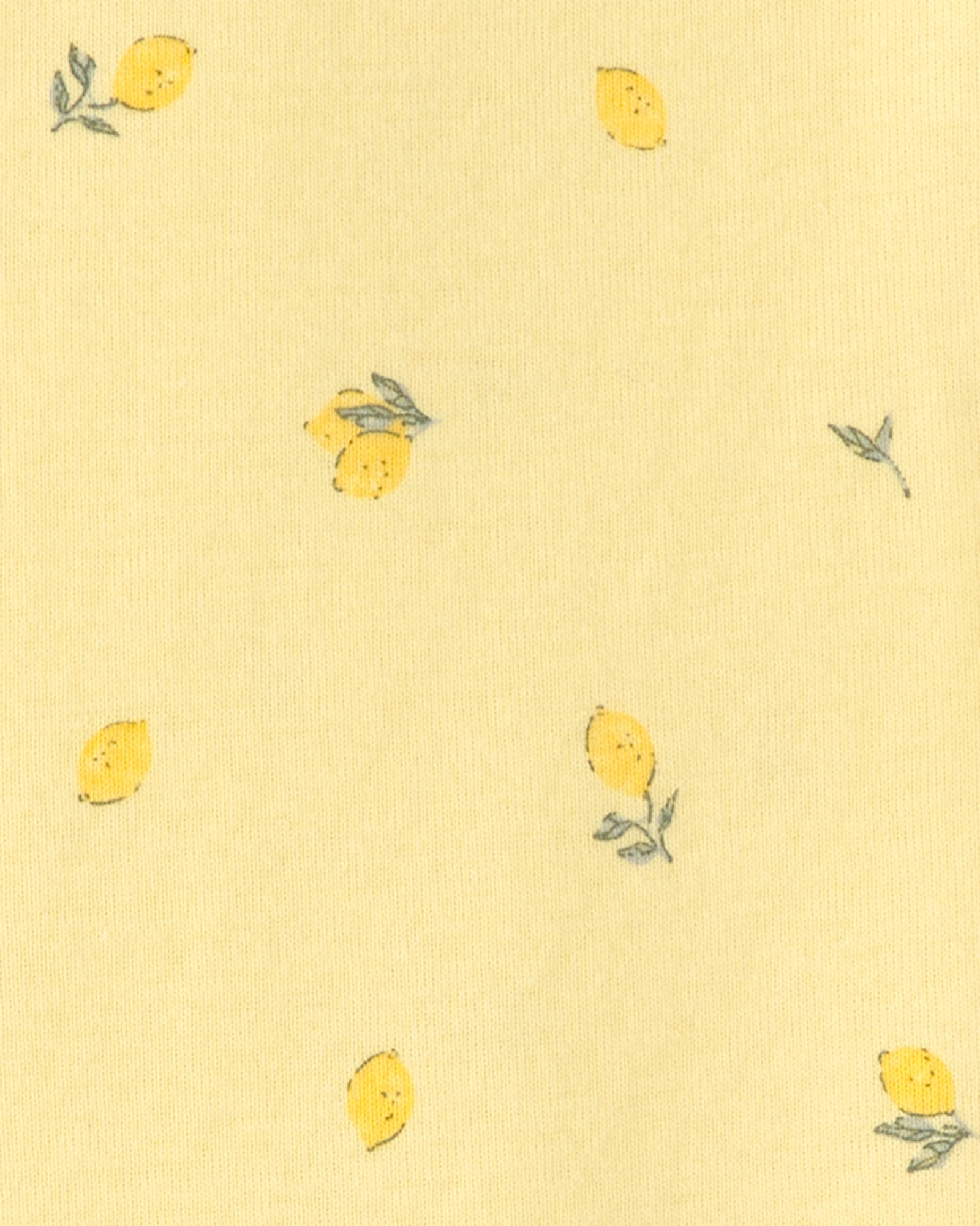 Pijama enterito de algodón con pie, amarillo, diseño limones. Talles 12-24M Pijama enterito de algodón con pie, amarillo, diseño limones. Talles 12-24M