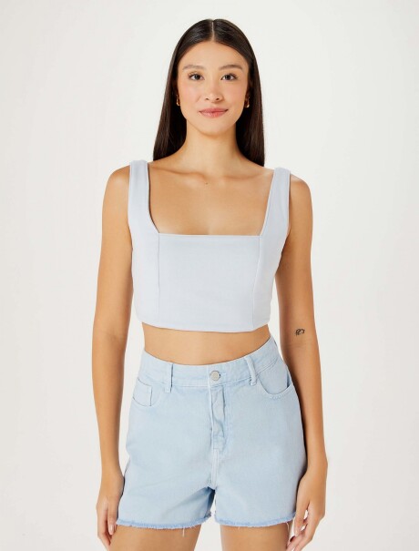 TOP FEMENINO ENTALLADO CELESTE