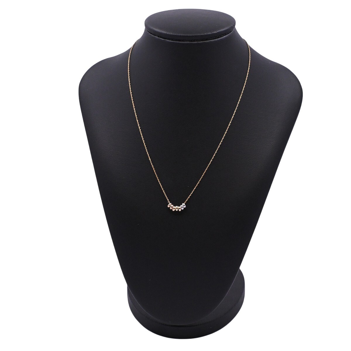 Cadena oro 18k con 7 dijes pasantes. 
