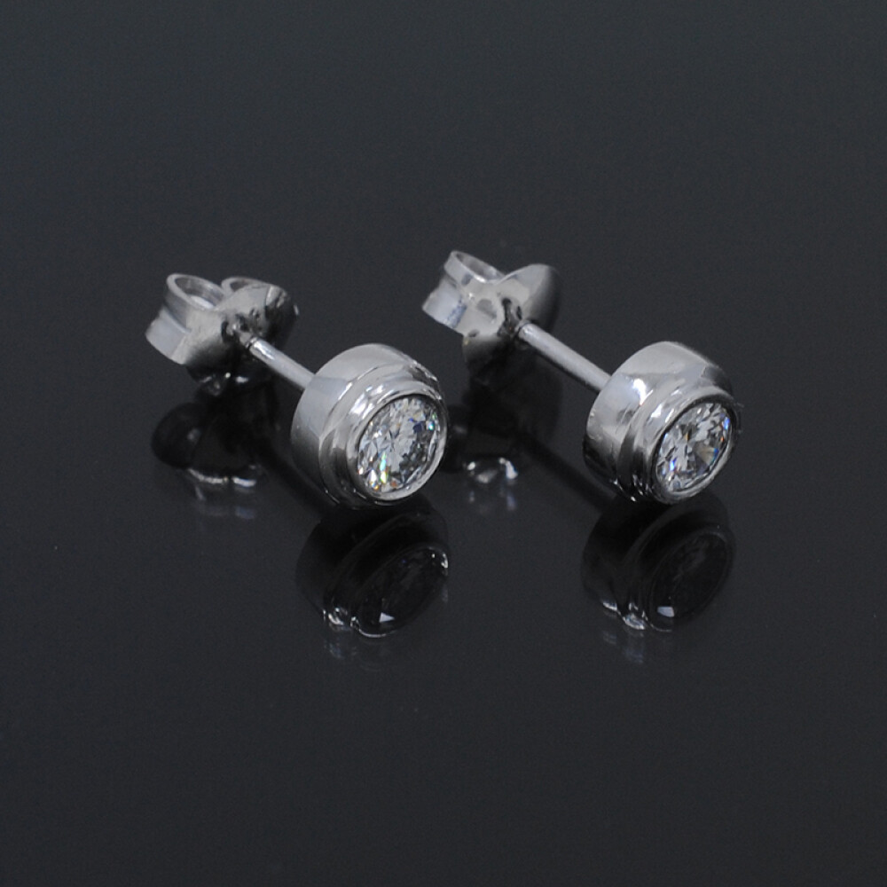 Caravanas en oro blanco 18k y brillantes Caravanas en oro blanco 18k y brillantes