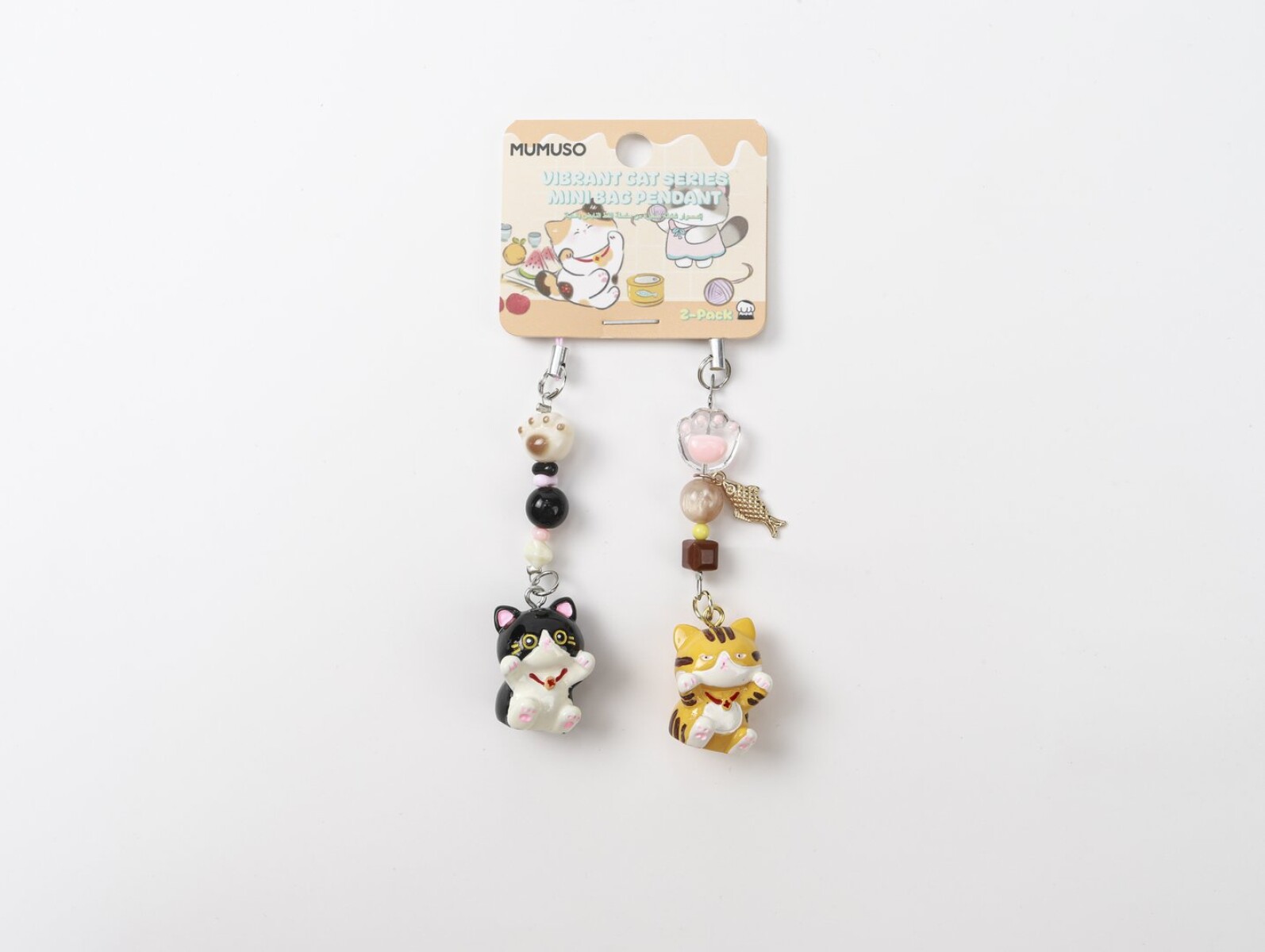 MINI COLGANTE PARA BOLSO SERIE GATOS VIBRANTES (PACK X2 / GATO VACA Y GATO NARAN 