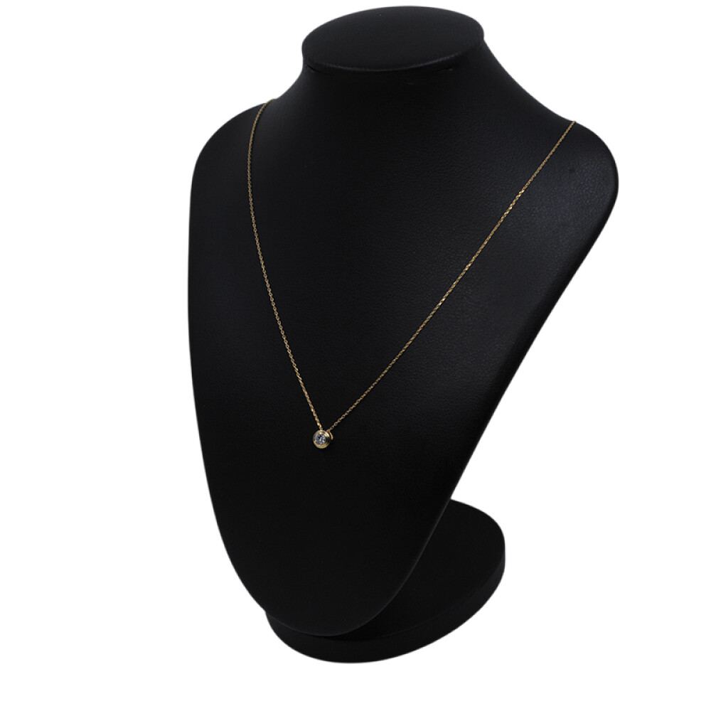 Dije en oro 18k y brillante engarce inglés Dije en oro 18k y brillante engarce inglés