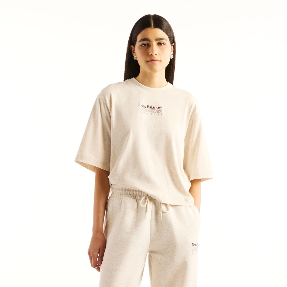 Remera Newbalance Trackside Relaxed mujer WT6272YXLIT - Crema 