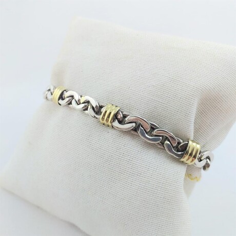 Pulsera de plata 925 grumette almendrada, con 7 trabas en double de oro 18 ktes. Pulsera de plata 925 grumette almendrada, con 7 trabas en double de oro 18 ktes.