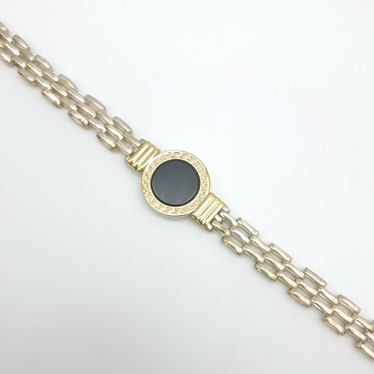 Pulsera de plata 925, double en oro 18 ktes y onix. 