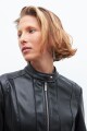 Chaqueta eco cuero con cortes en tul negro