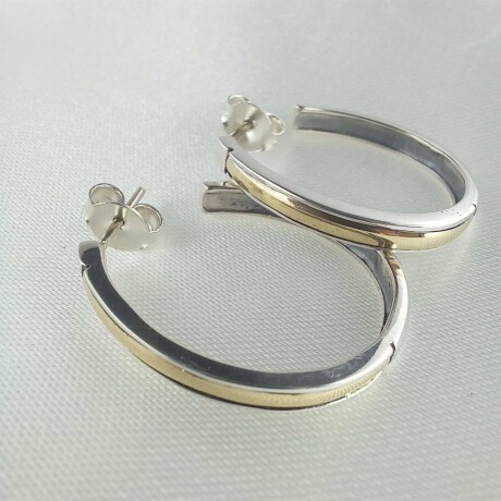 Aros de plata 925 con double de oro 18 ktes. Aros de plata 925 con double de oro 18 ktes.