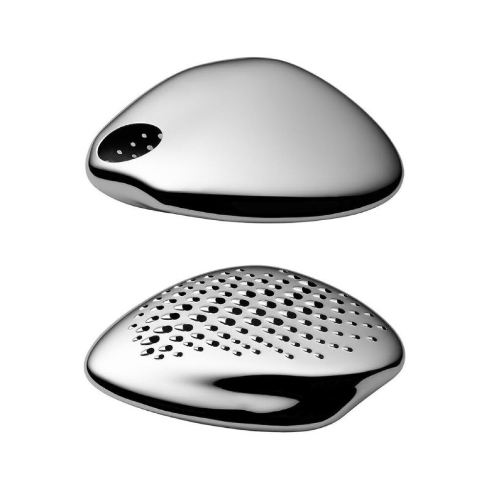 Designer grater made of 18/10 stainless steel and melamine base Designer grater made of 18/10 stainless steel and melamine base