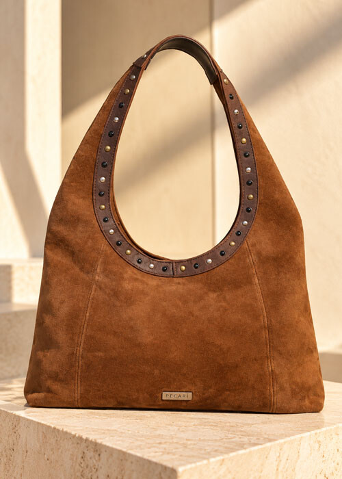Carteras, bolsos, mochilas, riñoneras, bandoleras